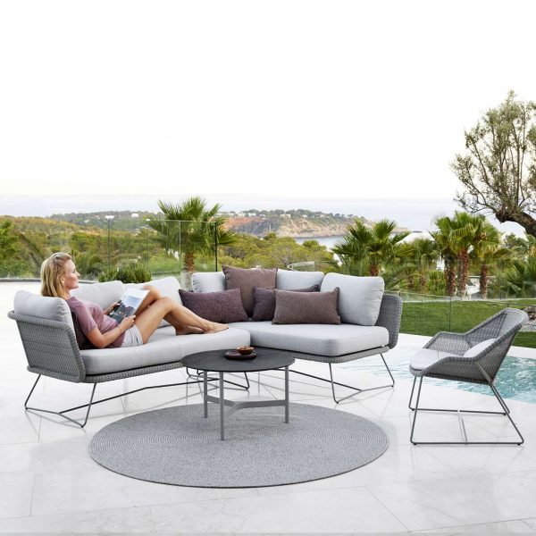 Horizon all-weather garden sofa is a modular outdoor sofa in luxury quality garden furniture materials by Cane-line modern exterior furniture -Twist modern garden coffee table is a luxury exterior low table in premium quality outdoor furniture materials by Cane-line garden furniture - Twist Table & Corner Sofa Configuration Of HORIZON All-Weather Garden SOFA Is A MODULAR Outdoor Sofa In LUXURY QUALITY Garden Furniture MATERIALS By Cane-line MODERN Exterior FURNITURE