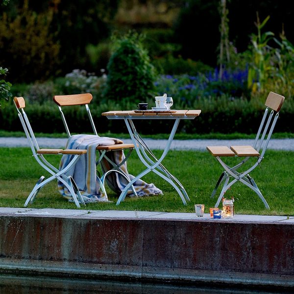 Image of Brewery classic folding garden furniture in galvanised steel and teak by Grythyttan Stålmobler Swedish furniture.