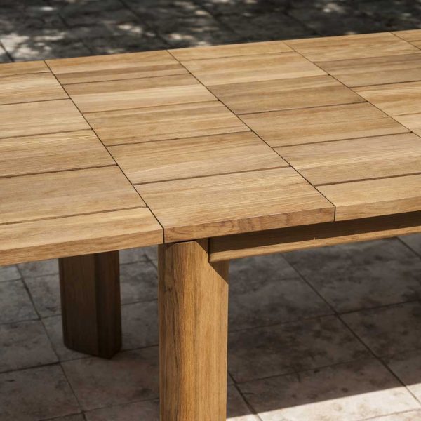 Detail of Brick extending garden dining table & solid teak outdoor table in high quality exterior furniture materials by RODA luxury outdoor furniture