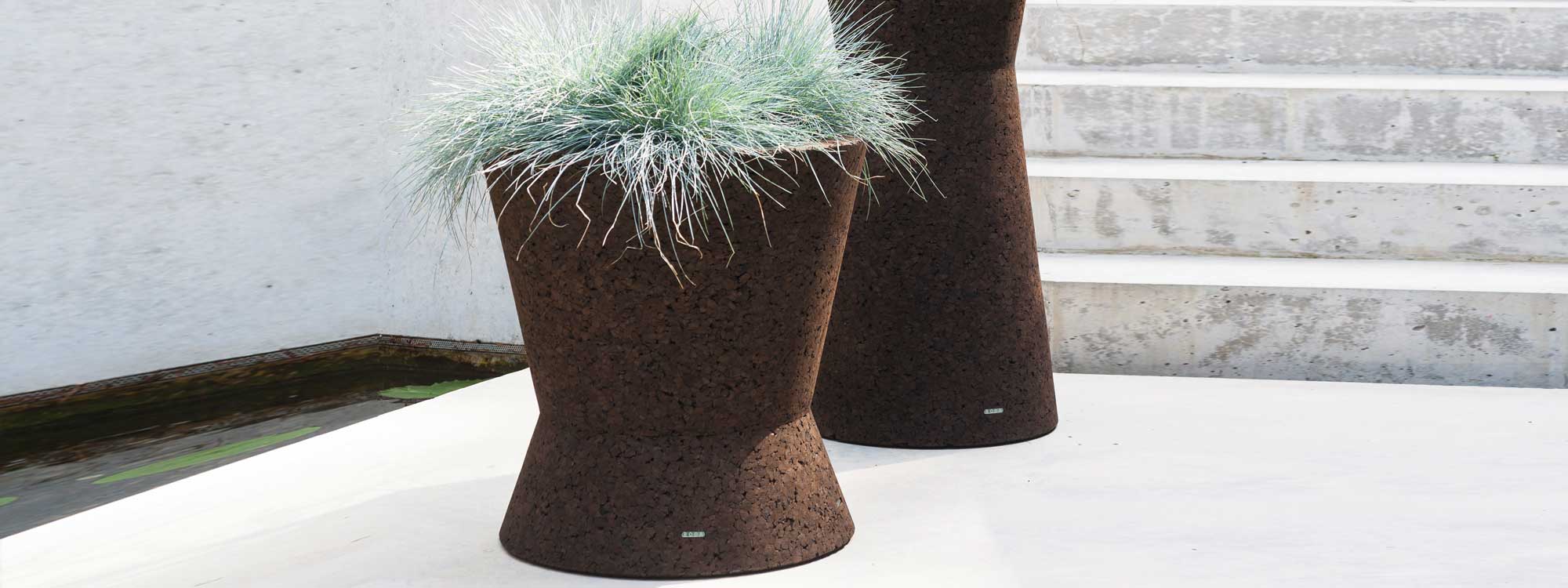 Bush On hour-glass shaped planter & eco planters are cork plant pots by Roda minimalist outdoor furniture company, Italy.