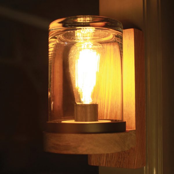 Image of illuminated Royal Botania Cloche teak outdoor light with hand-blown glass lampshade and filament bulb