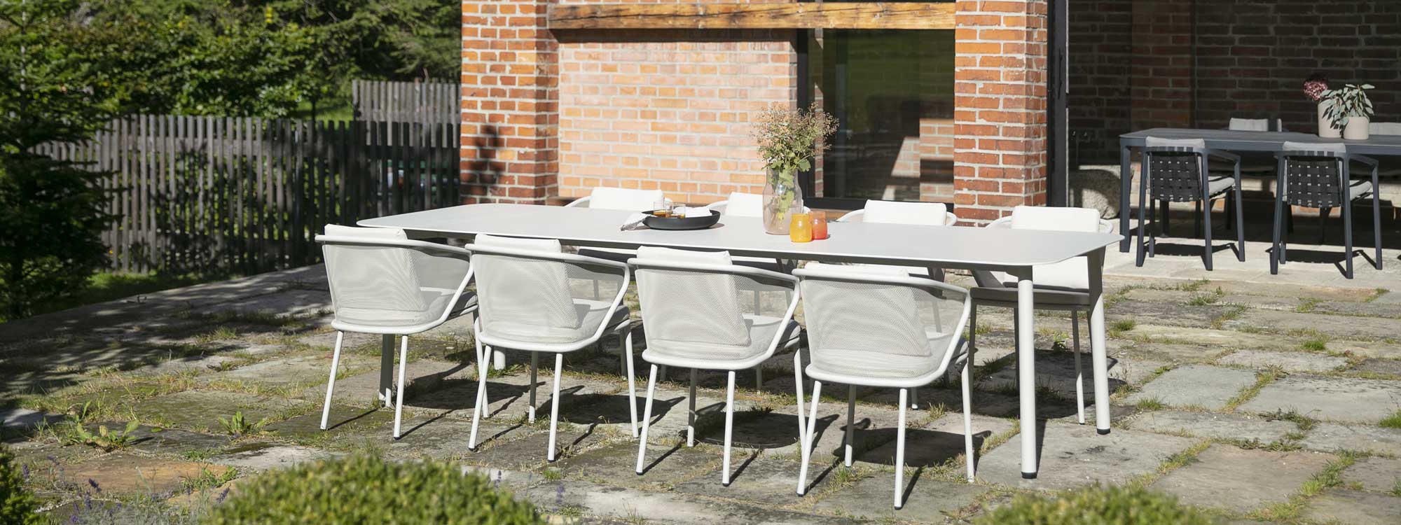 Image of Starling white garden table and Condor modern garden chairs by Studio Segers for Todus