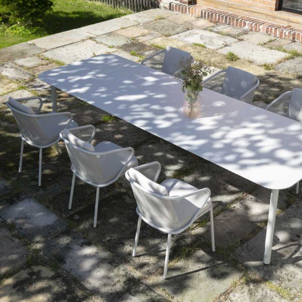 Image of aerial view of Condor garden chairs and Starling white dining table in sun and shade on terrace