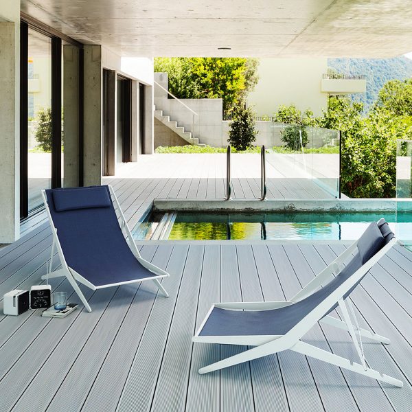 Boomy modern deck chair is a folding outdoor lounge chair in marine quality garden furniture materials by Coro outdoor furniture company.