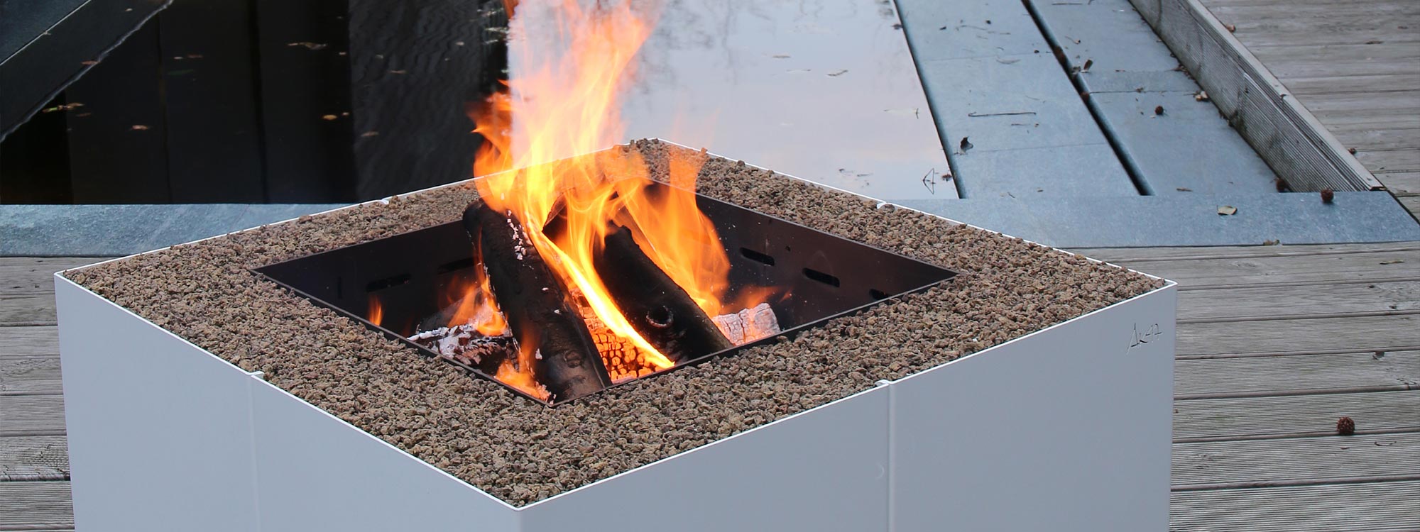 Dado geometric fire pit is a square modern fire pit in Vintage Brown or White fire pit finishes by AK47 luxury fire pit company, Italy.