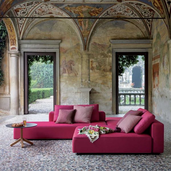 Image of Dandy pink garden sofa within classical garden room with vaulted ceiling with frescos