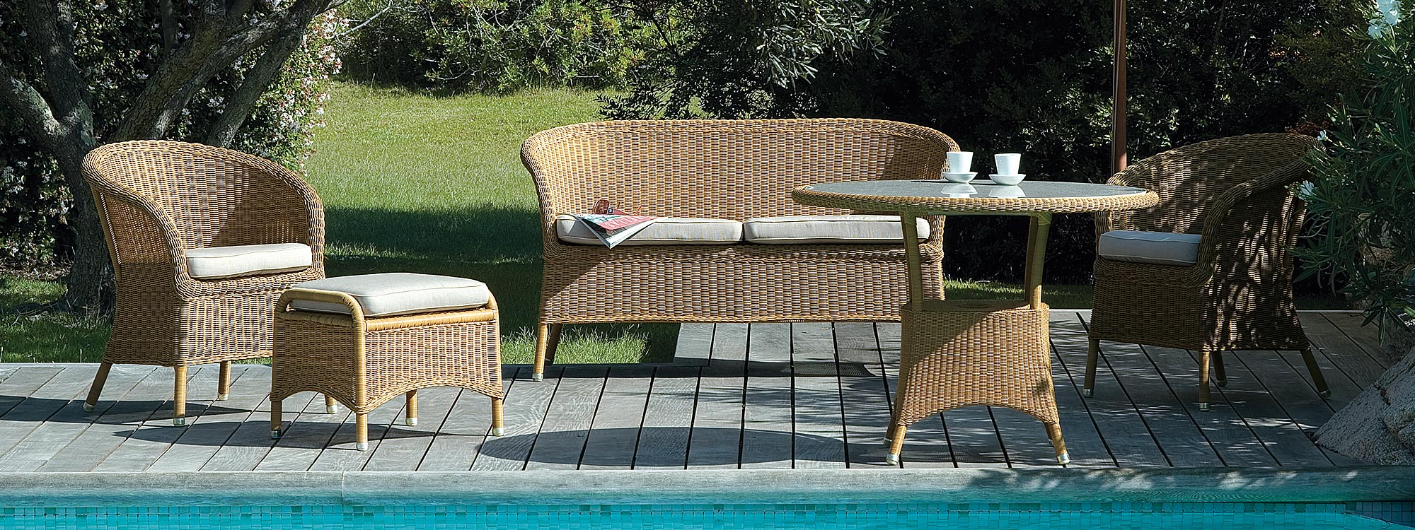 Derby rattan armchair is a classic garden chair in top quality garden furniture materials by Caneline cane furniture company - Denmark.