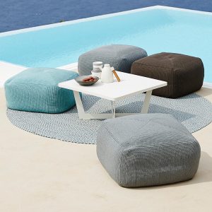 Divine garden pouf is a crocheted modern outdoor foot stool in high quality garden furniture materials by Caneline exterior furniture company.