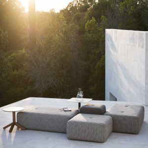 Dusk picture of Double outdoor ottomans & modern garden poufs in highest quality garden furniture materials by Roda luxury outdoor accessories company