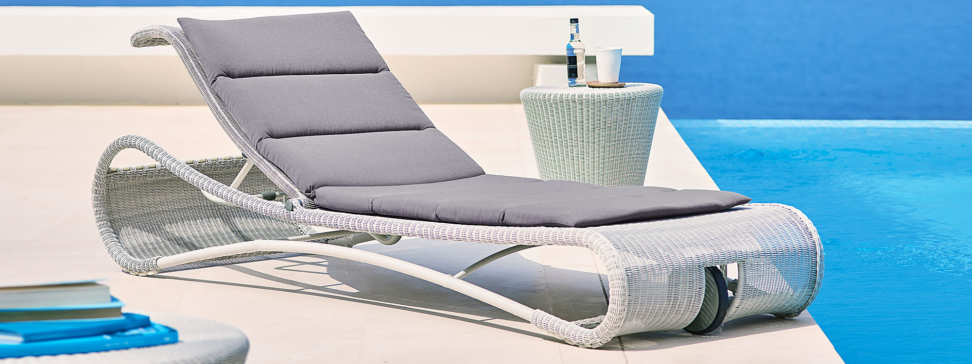 Escape all-weather rattan sun lounger is a modern sun bed made in luxury garden furniture materials by Cane-line rattan garden furniture co.