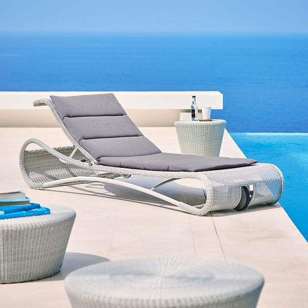 White-Grey Escape all-weather rattan sun lounger is a modern sun bed made in luxury garden furniture materials by Cane-line rattan garden furniture co.