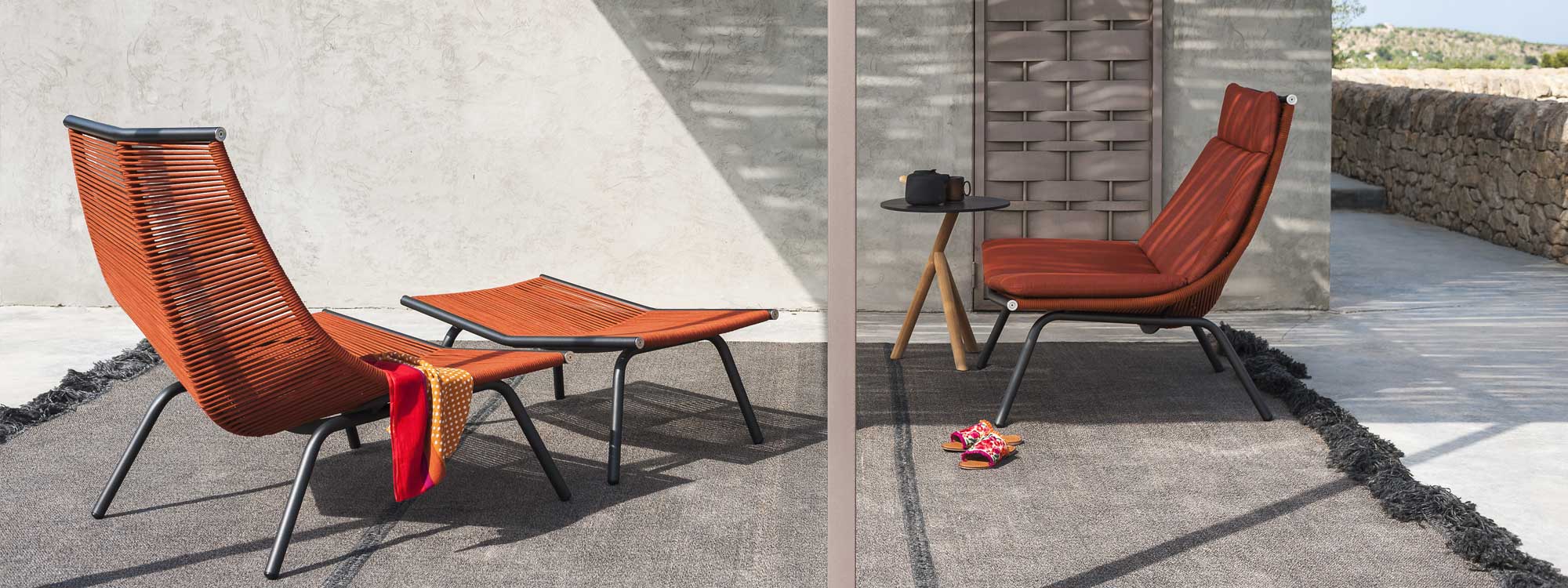 Pair of orange Laze garden chairs on modern terrace