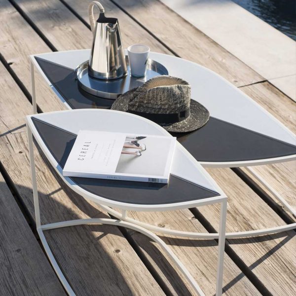 Image of pair of RODA Leaf outdoor coffee tables on weathered decking
