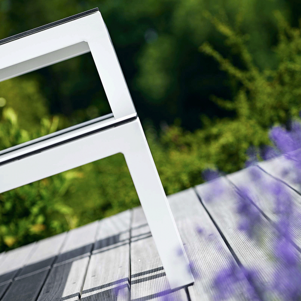 Image of detail of linear design of Leuven garden table and bench in white aluminium and white HPL by Todus