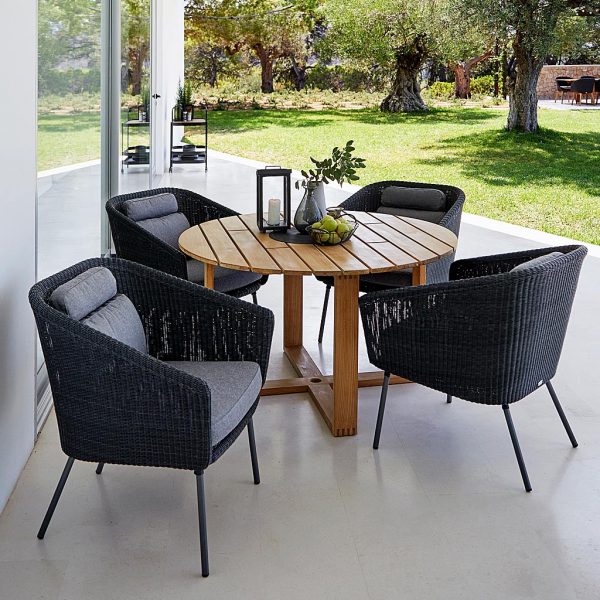 ENDLESS Table & Mega modern rattan garden chair is a woven outdoor dining chair in premium rattan garden furniture materials by Cane-line garden furniture Co.