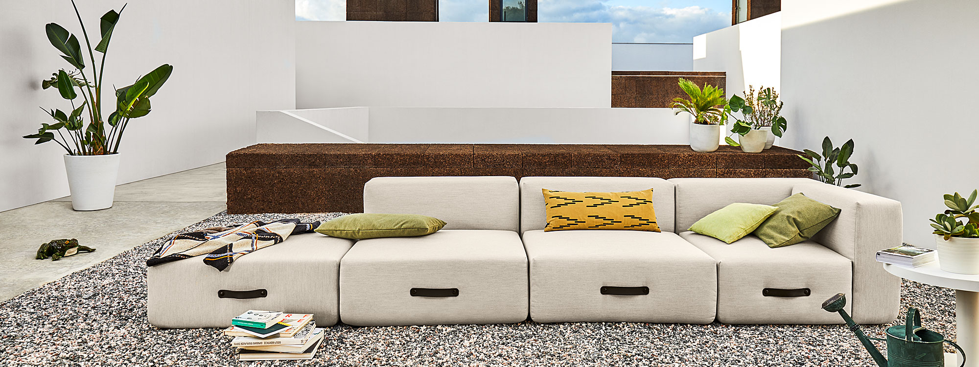 Image of Grey Miami garden sofa designed by Mark Braun for Conmoto modern garden furniture company, Germany.