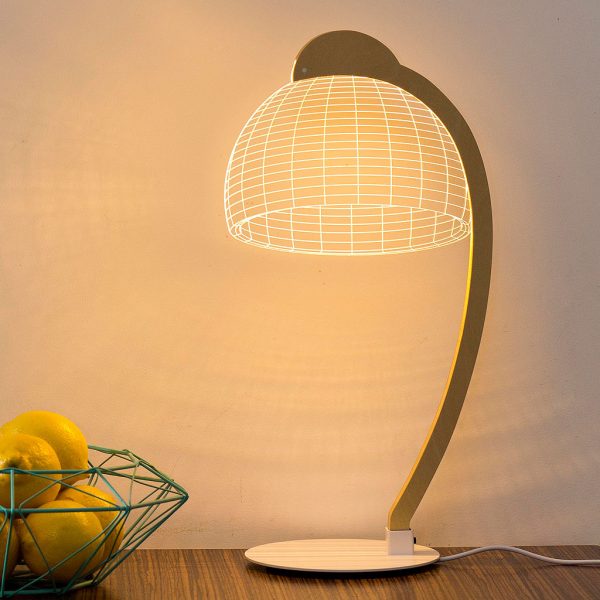 Image of illuminated Dome LED table light by Studio Cheha next to a bowl of lemons
