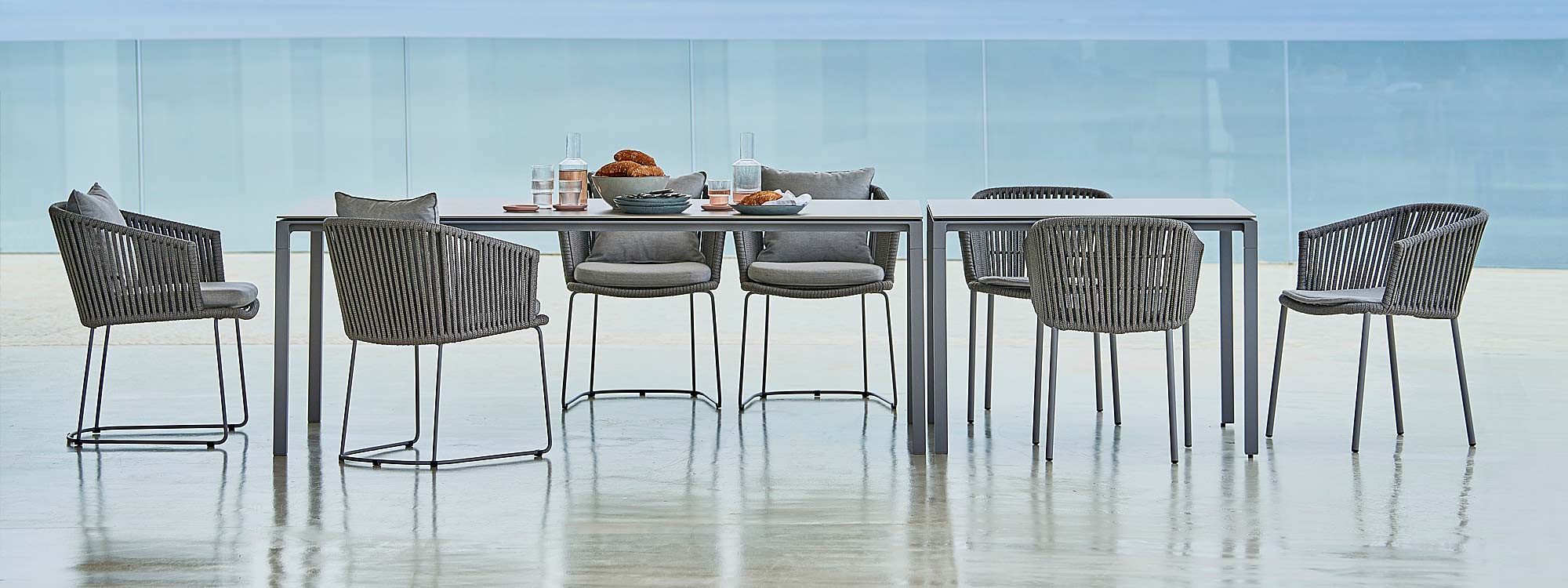 Image of Cane-line Moments light-grey dining chairs with light grey Pure rectangular dining table