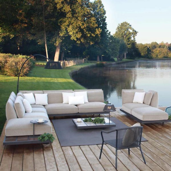 Lakeside installation of Mozaix Alu modern garden sofa is a luxury outdoor lounge set in high quality garden furniture materials by Royal Botania garden furniture