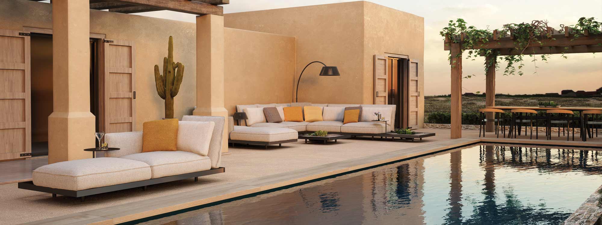 Image of Mozaix Aluminium garden sofa by Royal Botania in terracotta coloured terrace overlooking inviting swimming pool