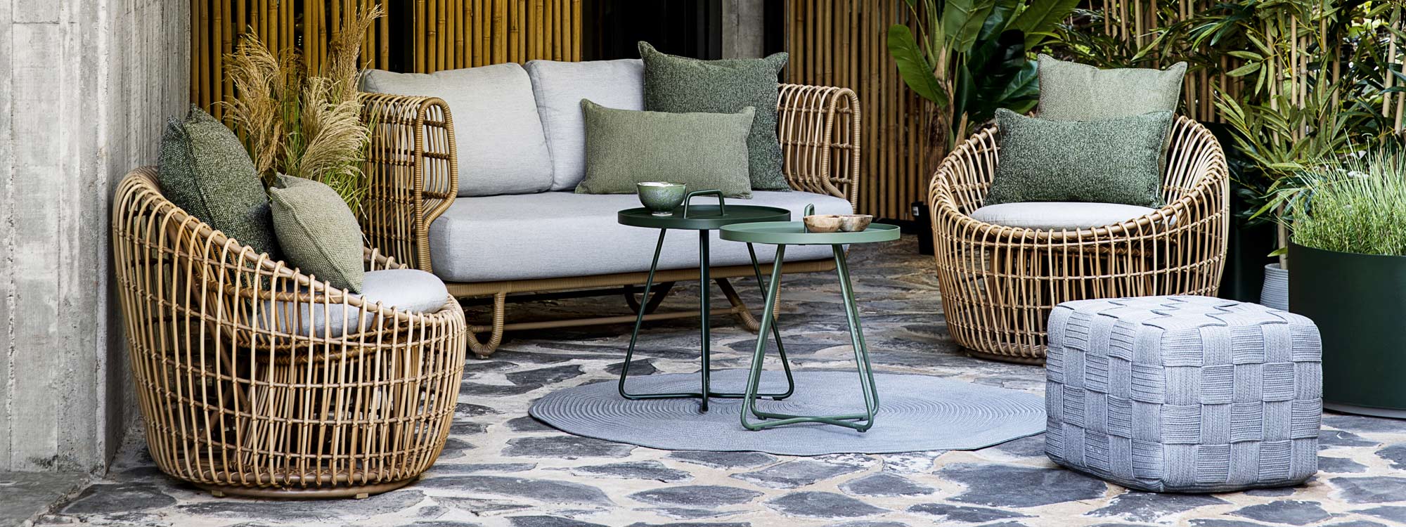 Nest modern wicker garden sofa is all-weather cane lounge furniture in high quality outdoor furniture materials by Cane-line luxury outdoor furniture.