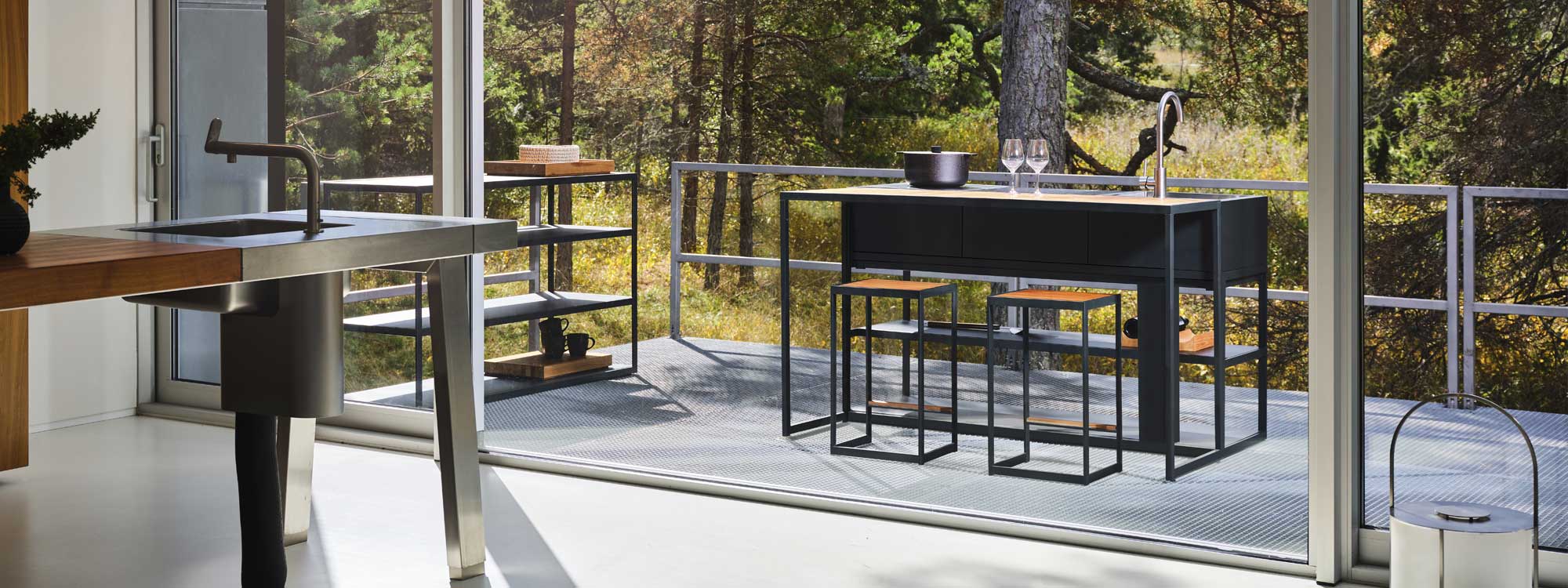 Image of compact outdoor kitchen and bar furniture configuration by Roshults on small terrace