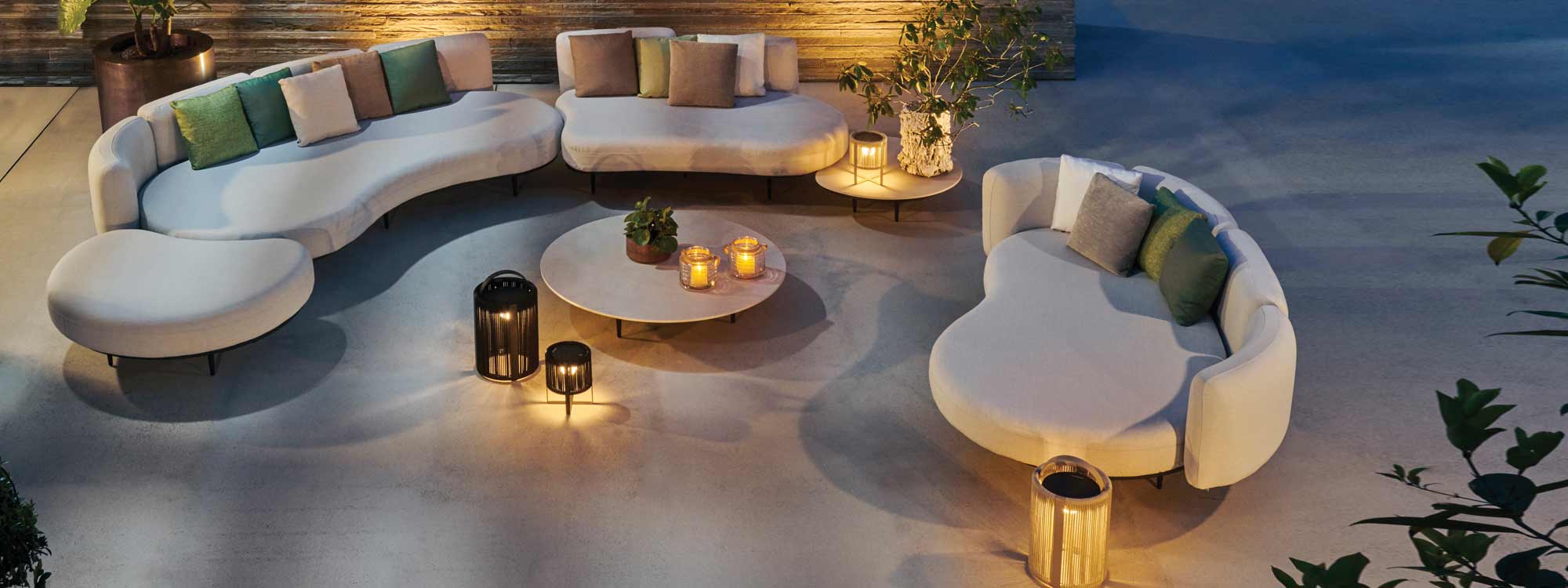 Nighttime shot of Organix contemporary garden sofa