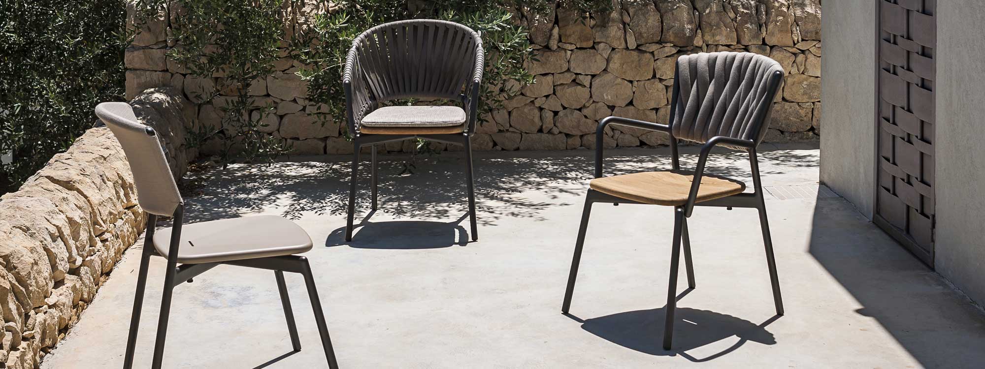 Image of 3 different Piper aluminium garden chairs by RODA on sunny Italian terrace