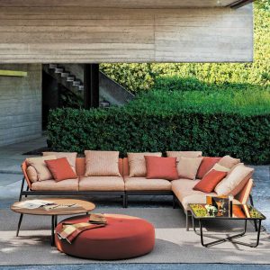 Image of Piper large orange garden corner sofa with Double round garden pouf and Piper round garden teak low table by RODA