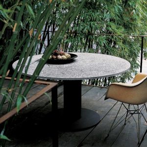 Platter modern garden table on terrace amongst bamboos