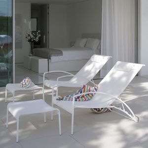 Image of pair of white QT recliner chairs and foot rests by Royal Botania