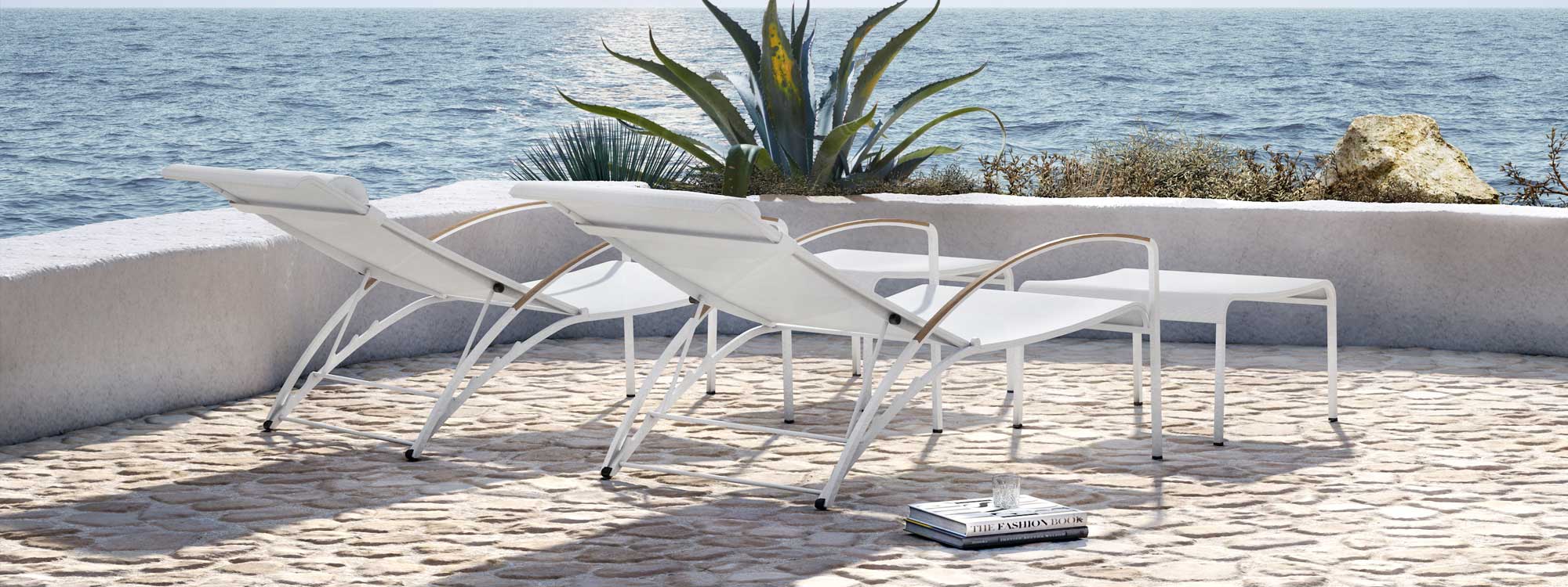 White QT195 modern reclining garden chair is a luxury garden lounge chair in quality stainless steel garden furniture materials by Royal Botania