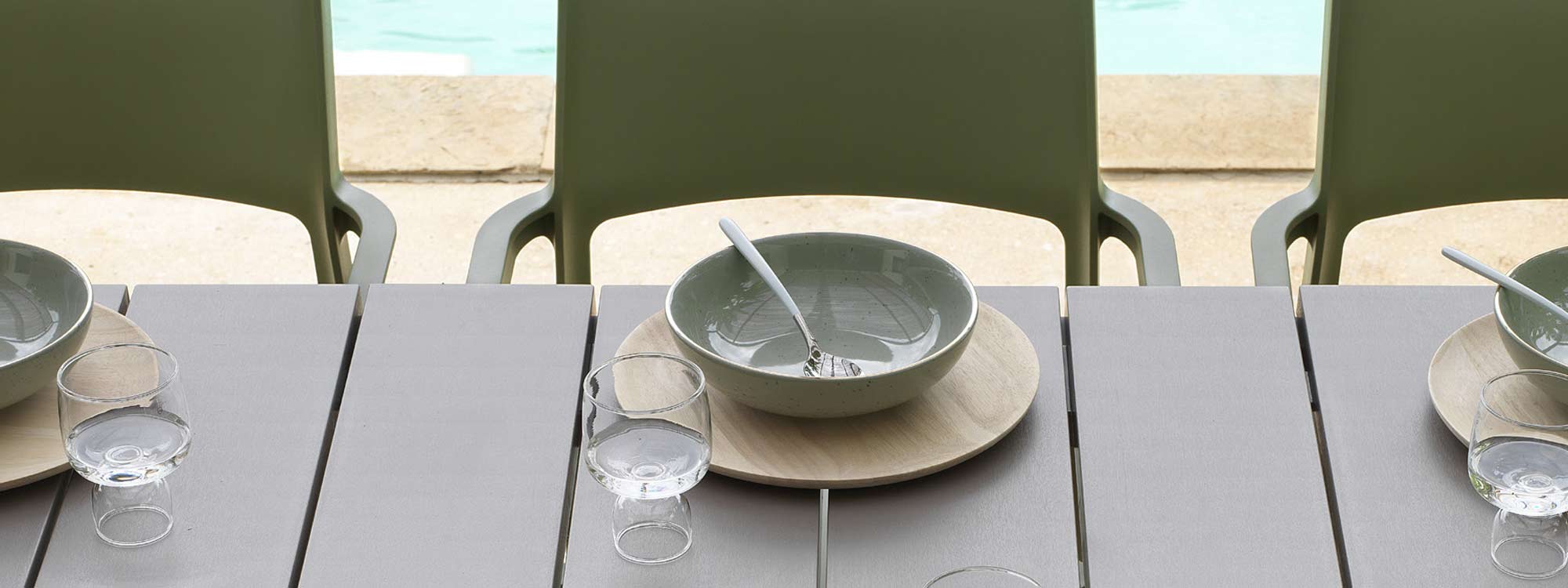 Image of Agave coloured Trill garden chairs and Rio modern outdoor table by Nardi, Italy