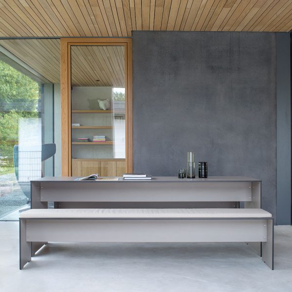 Riva taupe kitchen table and benches on polished concrete floor