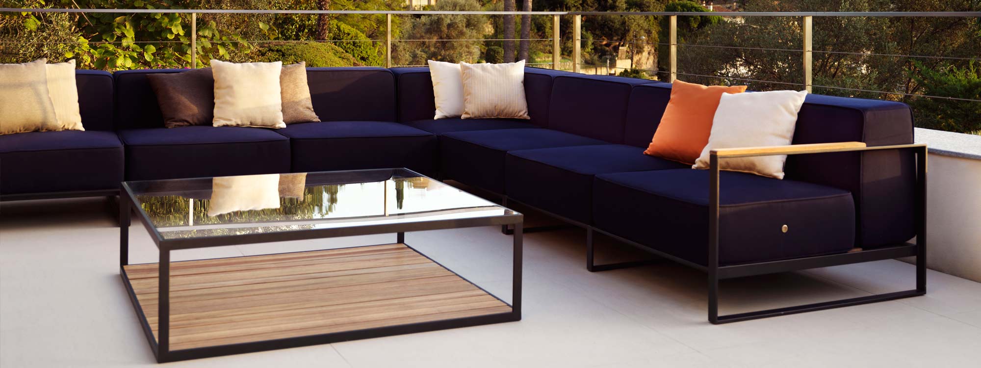 Image of Moore large garden corner sofa with anthracite coloured stainless steel frame and Navy Blue coloured Sunbrella fabric cushions