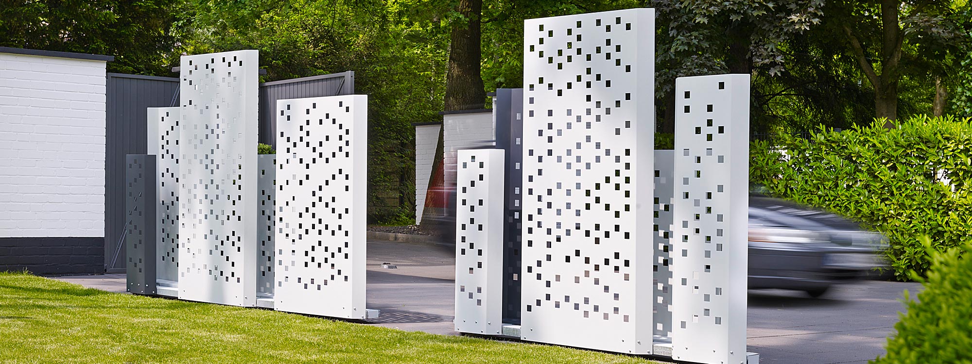 Separo modern outdoor screen is a geometric screen panel in quality exterior screen materials by Flora contract planter company, Germany.