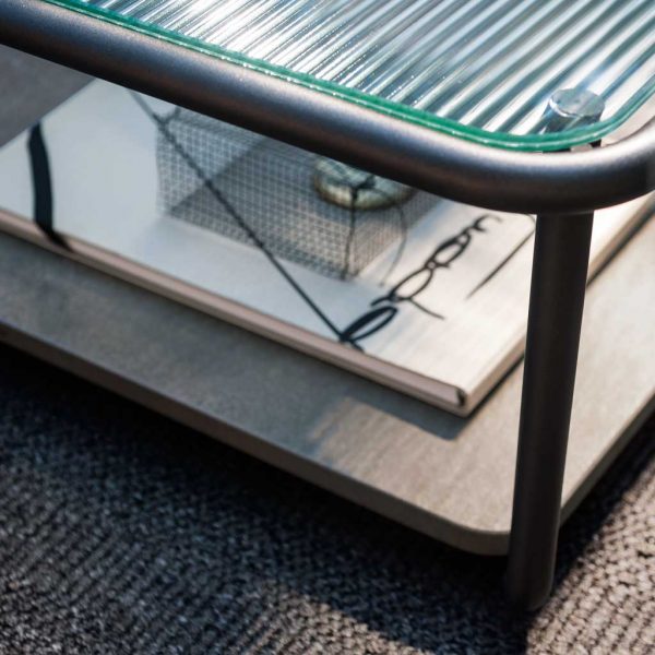 Sunglass outdoor coffee table with farsena stone lower shelf