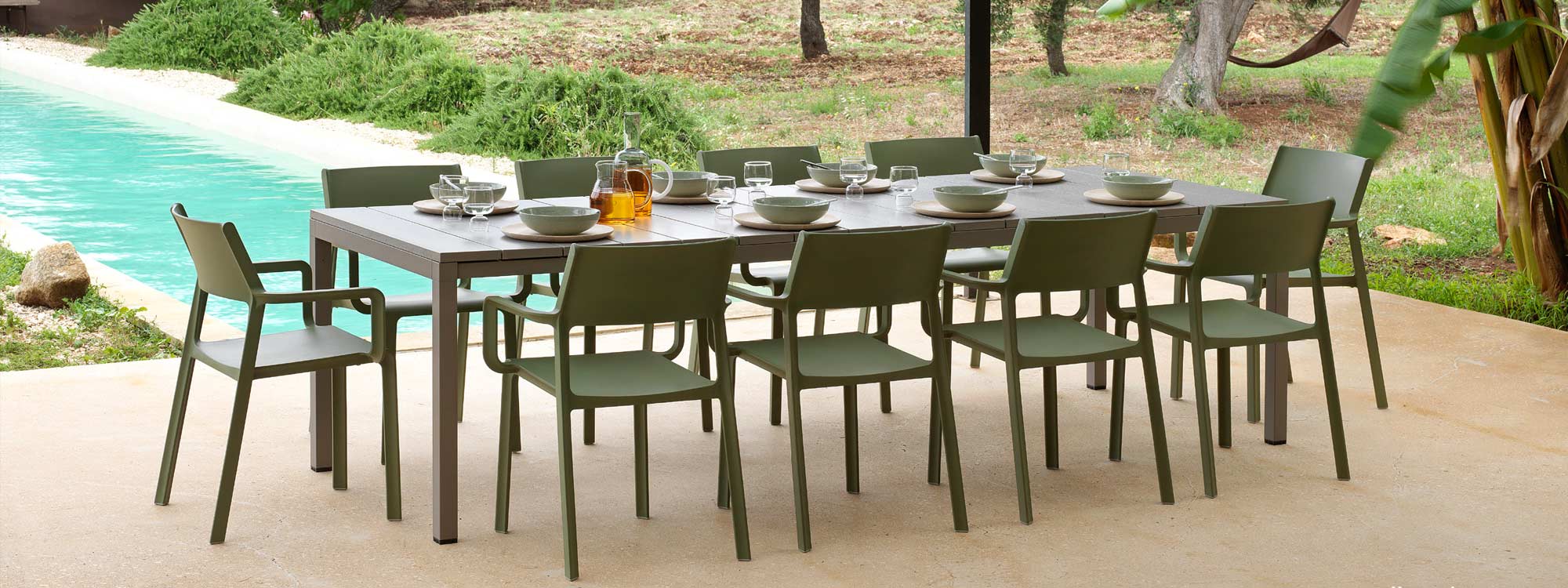 Image of Trill stacking outdoor contract chair and Rio modern outdoor table by Nardi