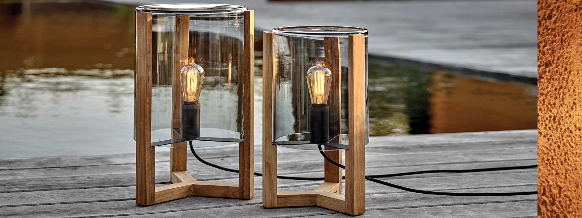 Image of pair of Royal Botania Tristar garden lanterns with teak frames and smoked glass lampshades & filament light bulbs