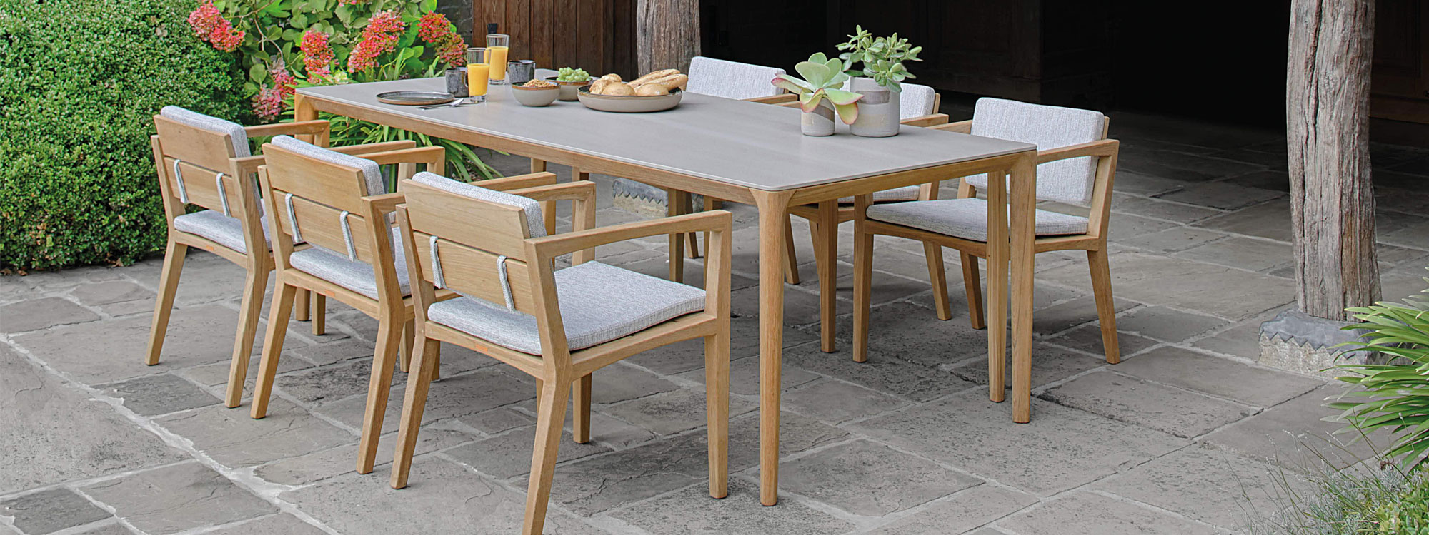 Zenhit teak chair & U-nite ceramic table by Royal Botania garden furniture