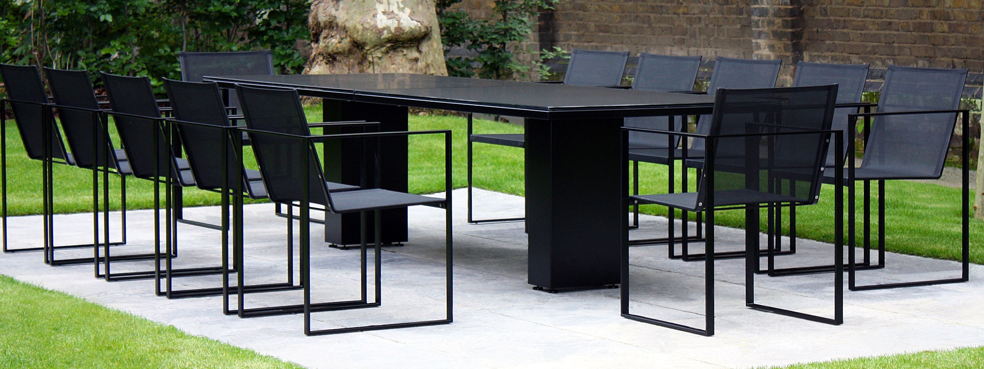 12-seat-contemporary-all-black-garden-table-glass-top.jpg