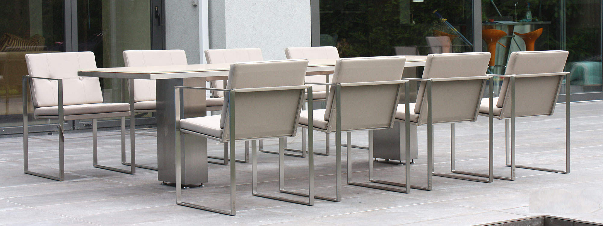 Image of 2010 garden furniture installations including Butaque minimalist garden chairs & Doble linear garden table by FueraDentro