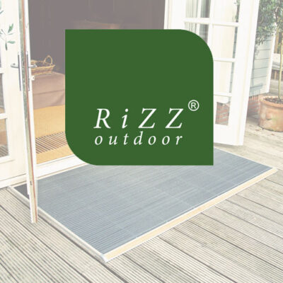 Image of RiZZ door mat logo overlaid over picture of door mat
