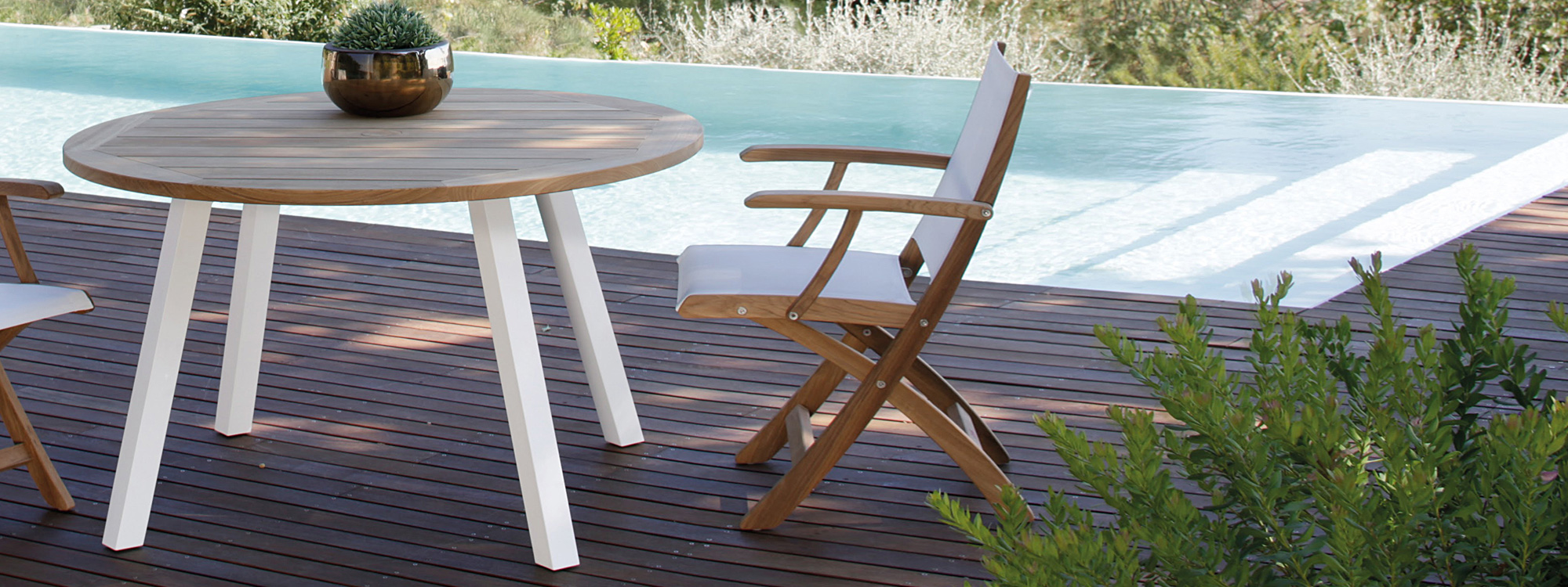 Royal-Botania-Round-teak-garden-table-three-white-legs-1.jpg