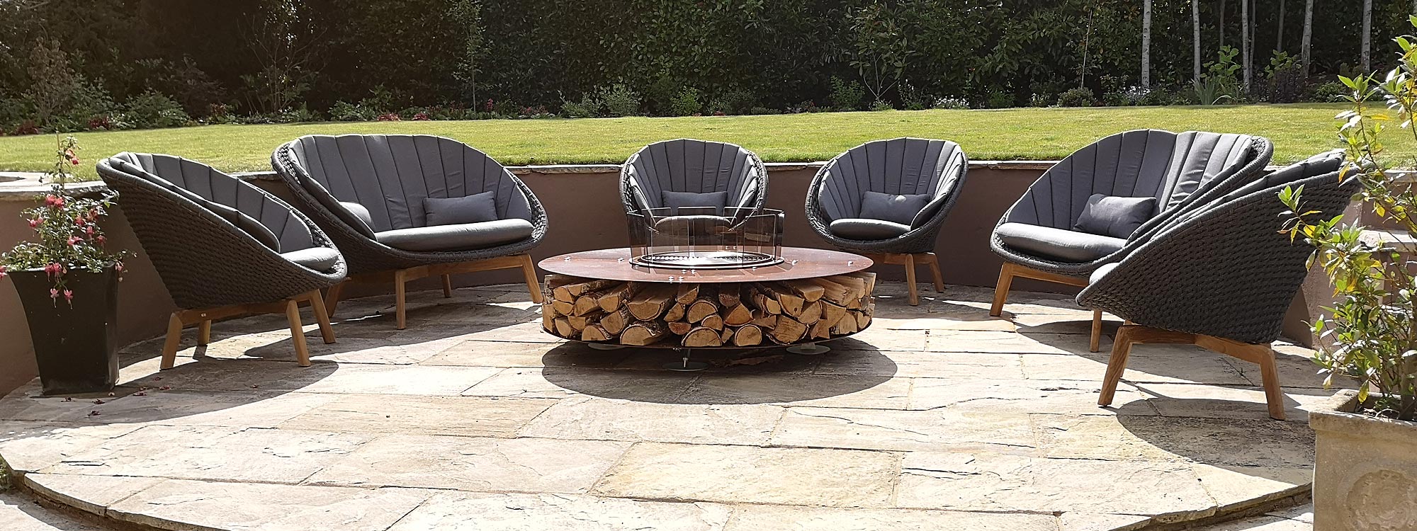 photo of luxury garden easy chair with modern design circular fire pit