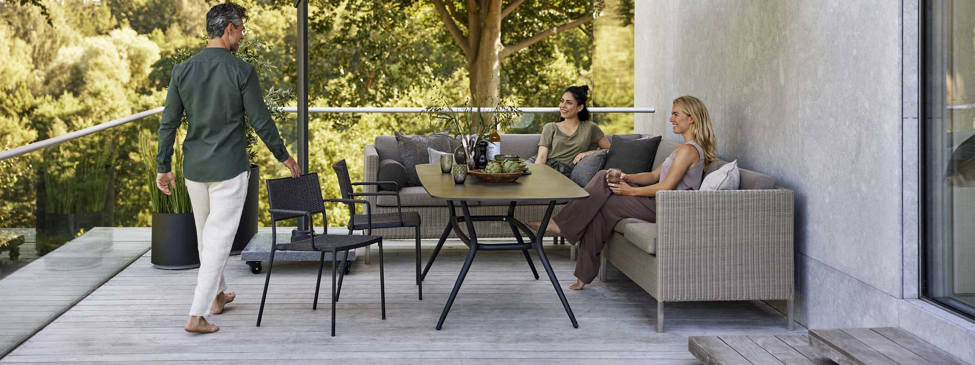 Image of Connect Dining Lounge corner sofa and Less chairs around Joy table by Cane-line garden furniture