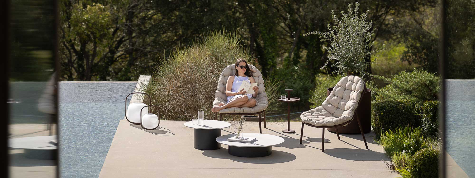 Albus garden lounge chair is a funky outdoor chair with deep cushion in stainless steel furniture materials by Todus luxury outdoor furniture