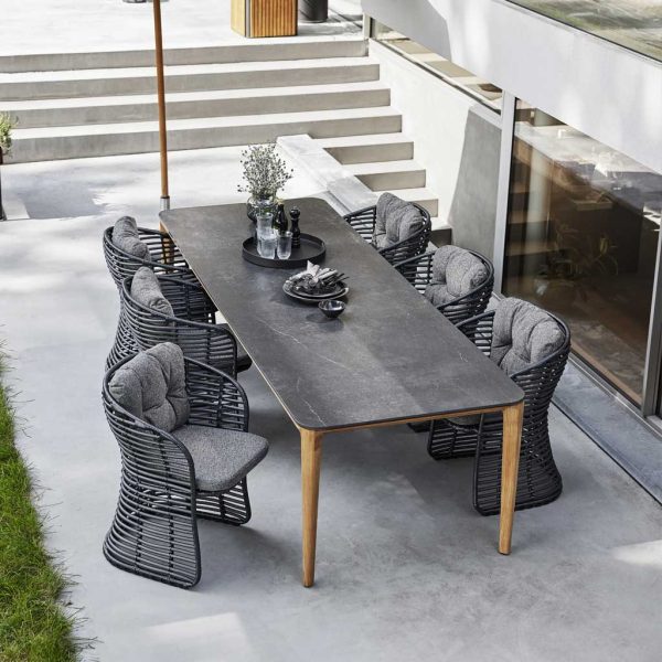 Image of black cane Basket chairs and Aspect black ceramic dining table by Cane-line garden furniture