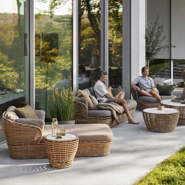 Image of Cane-line basket furniture on terrace shown in natural cane finish