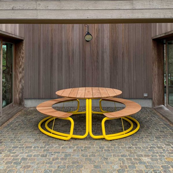 Image of The Circle yellow picnic table and benches with afzelia wood surfaces by Wunder